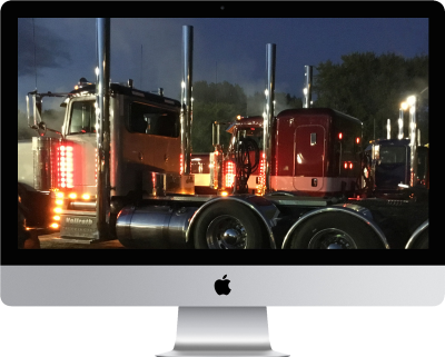 Carver County Fair photo of trucks displayed on a workstation monitor