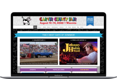 Carver County Fair website displayed on a laptop