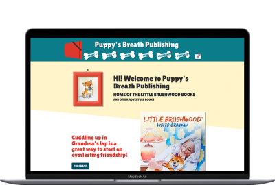 Puppy's Breath Publishing website displayed on a laptop
